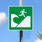 Cartello area di evacuazione tsunami E062